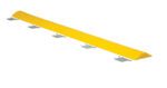 The Vestil Speed Bump-Glue Down 106X10X2 is a long, bright yellow bump featuring multiple metal mounting brackets for secure surface installation.