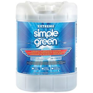A large white container of Simple Green® Extreme Extra Heavy Duty - 5 Gallon rests against a blue background. Its an aircraft and precision cleaner with multilingual labels, intended for heavy industrial use.
