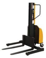 The Vestil Stacker Narrow Mast Adj Forks 98 In 1.5K features a vertical lift, adjustable forks, and a distinctive yellow-black design, efficiently handling pallets up to 98 inches high in warehouses while supporting loads of 1.5K pounds.