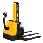 The Vestil Stacker Narrow Mast Pwr Drive Aa 90 showcases a yellow and black design, ideal for precise maneuvering. It features a control handle, 90 prongs for lifting pallets, and safety labels for enhanced usability.