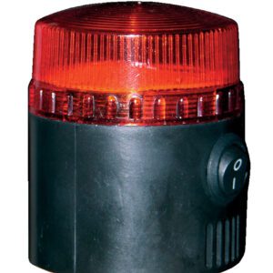 A compact, cylindrical black alarm with a ribbed red lens at the top, similar to the Vestil Light & Siren for Spring Loaded Bollard, featuring a power switch on its side. The translucent red lens is designed to glow when activated.