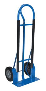The Vestil HD P-Handle Truck 600 Lb Hard Rubber features a blue frame with two wheels and a flat base, allowing effortless lifting of up to 600 lb. With black grips and hard rubber tires, it ensures easy handling and stability for moving heavy items.