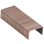 A large, metallic staple from the MH-USA 3/4 Stick Feed Staples (50/Stick) set lies on a white surface, featuring parallel grooves along its length for a textured look.