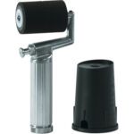 Displayed is the Rolmark Fountain Roller, showcasing a metal handheld design with a textured grip and sleek black cap, expertly coated with black ink.