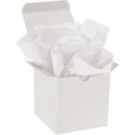 An open box overflowing with crumpled MH-USA 10 x 15 White Gift Grade Tissue Paper (960 Sheets) is set against a pristine white background.