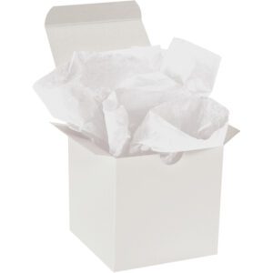 An open box overflowing with crumpled MH-USA 10 x 15 White Gift Grade Tissue Paper (960 Sheets) is set against a pristine white background.