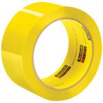 A roll of 2 x 55 yds. Yellow Scotch® Box Sealing Tape 373, with a glossy finish, is displayed on its side, highlighting its circular shape. The core features branding, exemplifying the quality found in each of the 36 rolls per case.