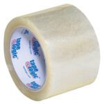 A 24/case pack of 3 x 55 yds. Clear Tape Logic® Lbs291 Industrial Tape, with a glossy finish and a white core printed with blue and red tape logic text, highlights its premium quality.