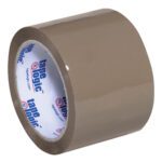 A roll of Tape Logic® 3 x 55 yds. Tan Industrial Tape (LBS291) with a shiny finish stands upright on a white background, revealing the brand name and logo in blue and white on the inner core. Its available in a convenient 6-pack for reliable packing needs.