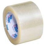 The Tape Logic® Lbs400 Industrial Tape is a 3 x 110 yds. clear glossy tape, showcasing a white and blue logo on the inner core. This slightly reflective packing tape comes conveniently in a 6-pack.