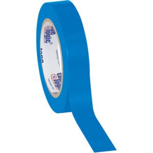 A roll of Tape Logic® 1 x 36 yds. Blue (3 Pack) Solid Vinyl Safety Tape is partially unrolled, adhesive side exposed, with branding inside, positioned diagonally on a white background.