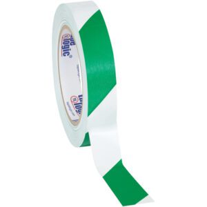 A roll of 1 x 36 yds. Green/White Tape Logic® Striped Vinyl Safety Tape, with a green and white diagonal pattern, features an unclear blue and orange logo on the label. It comes in a case of 48 rolls, partially unrolled for easy use.