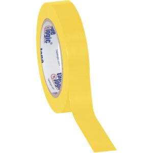A roll of 1 x 36 yds. Yellow Tape Logic® Solid Vinyl Safety Tape stands upright, with its yellow length extending outward, featuring branding and text on a white background. (48 Rolls/Case).