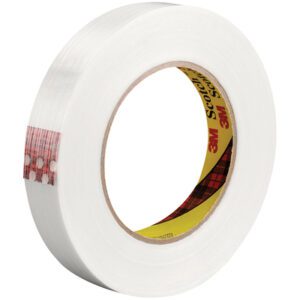 A partially unwound roll of 3M™ 8915 Strapping Tape, measuring 3/4 x 60 yds., features a red and black tartan label inside the core with brand name and logo, available in a convenient 12 pack.