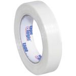 A neat roll of 1 x 60 yds. Tape Logic® 1300 strapping tape features a transparent design with a white label inside with blue text. Available in a bulk case of 36 rolls for convenience.