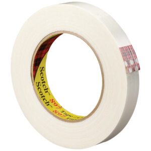 A roll of 1 x 60 yds. Scotch® Filament Tape 897, featuring a white edge with the iconic red plaid and yellow label with black text, packed in a practical case of 36 rolls.