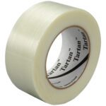 A partially unwound roll of 2 x 60 yds. Tartan™ Filament Tape 8934 (24/Case), with a glossy finish, reveals its thickness and texture, and has Tartan labeled on the inner core.