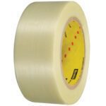 A large roll of 3 x 60 yds. (3 Pack) Scotch® Filament Tape 898 with a light yellow tint features a yellow inner core with red text and black branding, shown standing upright on its side.