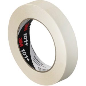 A roll of 1 x 60 yds. 3M Value Masking Tape 101+ with a black inner label and red 3M logo. Partially unwound, its matte texture ensures quality. Available in cases of 36 rolls for convenience.