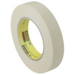 A beige roll of 3M General Purpose Masking Tape 234 (1 x 60 yds.) features a yellow inner ring and stands upright, highlighting its Scotch brand reliability and versatility for various projects.