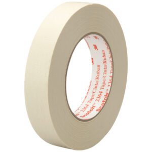 A roll of 1 x 60 yds. 3M™ 2364 Masking Tape (36/Case) from Scotch is shown upright, highlighting its circular form and thickness. The inner core has red text on a white background.