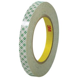 A 1/2 x 36 yds. 3M - 410M Double Sided Masking Tape roll, featuring a green plaid pattern, partially unraveled to show its adhesive sides; the yellow core displays the iconic 3M logo.