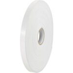 Standing upright against a white background is a tightly coiled large roll of 1/2 x 36 yds. (1/16 White) Tape Logic® Removable Double-Sided Foam Tape, revealing its inner cardboard core.