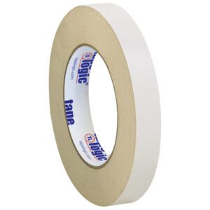A 3-pack of Tape Logic® 3/4 x 36 yds. Double Sided Masking Tape stands upright, with blue text on the cardboard core. The tapes appear partially unwound, subtly showcasing their texture and adhesive side.
