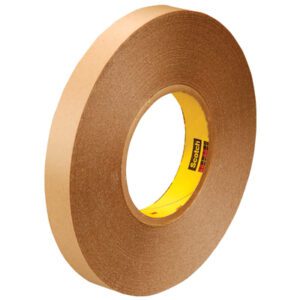 A roll of 3M™ 9425 Removable Double Sided Film Tape, sized 3/4 x 72 yds, with a yellow and red core that partially reveals the Scotch brand name is placed against a plain white background.