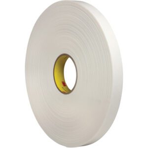 A large 1 x 5 yds. roll of 3M™ 4462 Double Sided Foam Tape stands upright on a plain background, showcasing its wide diameter with layers coiled around a brown core, and a hint of yellow surface visible inside.