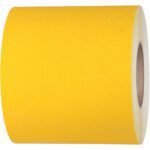 A roll of 6 x 60 Yellow Heavy-Duty Tape Logic® Anti-Slip Tape (1 Roll/Case) rests on a white background, with one end slightly visible.
