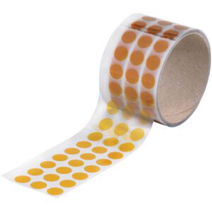 This roll of 1/2 diameter Kapton® Discs (1000 per roll), partially unrolled, highlights a repeating orange dot pattern. Perfect for precise applications, it comes with a durable cardboard core.