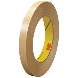 A roll of 1/2 x 60 yds. brown masking tape with a yellow core and red 3M logo is displayed upright against a white backdrop, part of the 3M™ 465 Adhesive Transfer Tape Hand Rolls (72/Case).