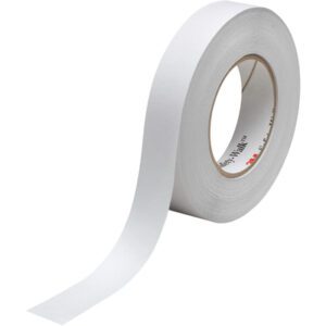 A partially unrolled roll of white adhesive tape shows its textured surface, similar to the 1 x 60 Clear 3M™ Safety-Walk™ Tape - 220. Inside the roll, brand markings and vibrant text in red and black can be seen.