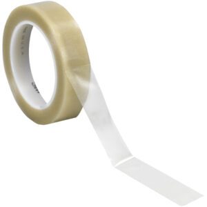 On a plain white background, a roll of 1 x 36 yds. Clear 3M Vinyl Tape 471 (36 Rolls/Case) is showcased with its transparent texture and subtle beige tint as a section unrolls.