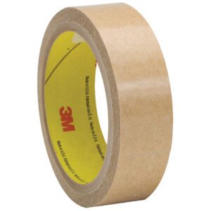A roll of 3M™ 927 Adhesive Transfer Tape Hand Rolls, measuring 1 x 60 yds., showcases the 3M logo inside its yellow core while standing on edge against a white background.