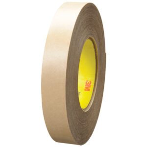 A 1 x 60 yds. 3M™ 9485PC Adhesive Transfer Tape Hand Roll (36 rolls/case) stands upright, displaying its yellow core against a white background, emphasizing its precision engineering and durability.