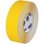 A 2 x 60 roll of yellow heavy-duty anti-slip tape from Tape Logic® highlights its quality and durability with a branded inner ring.
