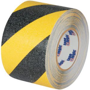 The 3 x 60 Black/Yellow Striped Heavy-Duty Tape Logic® Anti-Slip Tape features durable construction with a blue and red Tape Logic logo on the core for a secure grip, ensuring enhanced safety in various applications.