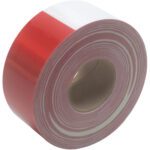 The thick roll of 3 x 150 Red/White 3M™ 983 Reflective Tape (1 Roll/Case) is shown at an angle, revealing tightly wound layers and an alternating pattern of reflective red and white stripes, ideal for visibility enhancements.