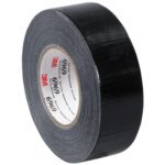 A roll of 3M™ 6969 duct tape in glossy black stands on its edge, part of the 2 x 60 yds. Black (3 Pack) bundle. The inner side shows text and codes, indicating brand details and showcasing the thick, reliable width of this trusted tape.