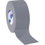 A roll of Tape Logic® 9 Mil Duct Tape from a case of 16, partially unwinds to show its adhesive side. The inner cardboard, with blue and white branding, stands upright on a white background, showcasing the quality in each case.