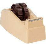 This beige label maker, similar to the 3M™ C22 3 Core Table Top Dispenser, has two dark brown rotating wheels and a sleek metallic cutting edge.