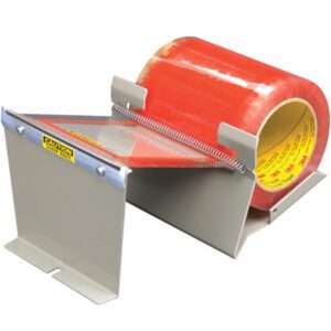 The 3M™ M727 Scotch® Pouch Tape Dispenser, made of gray metal and equipped with a serrated cutting edge, holds a roll of red adhesive packaging tape. It features labels reading Caution in bright yellow and red for enhanced safety and reliability.