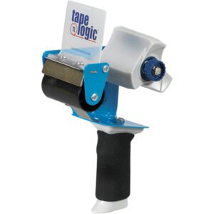 The Tape Logic® 3 Comfort Grip Carton Sealing Tape Dispenser features a black handle, blue frame, and clear tape roll. It has an adjustable tension knob and cutter for smooth application, making packing effortless.