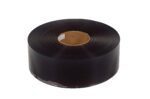 A large roll of black plastic film, similar to the Vestil Roll for Vinyl Strip Door 0.06 Thickness, has a sturdy brown cardboard core, is coiled neatly, and viewed from a slight angle.
