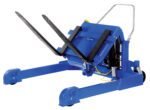 The Vestil Tilt Master Strad Ac Power & 6000 Lb Cap is a blue mechanical drum tilter with two long prongs, a handle, and wheels for mobility. It features an AC power tilting mechanism for precise control and is designed for rotating and handling large drums.