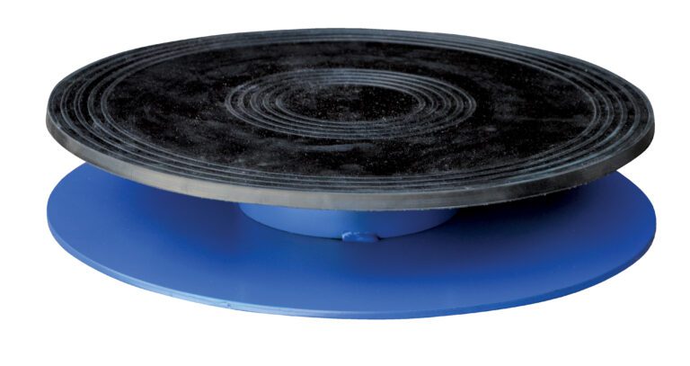 The Vestil Turntable, featuring an 18-inch diameter and a 3.437-inch height, comes in blue with a black concentric circle-marked platform, offering an elegant rotating display for objects or art, supporting up to 0.5K weight effortlessly.