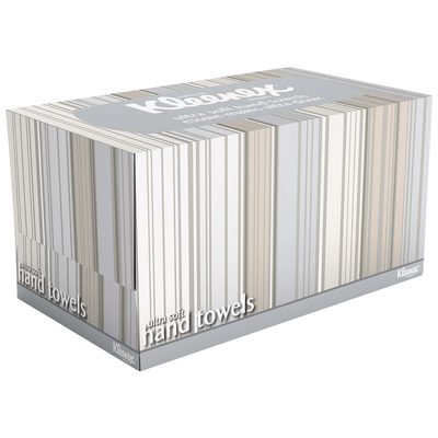 TTWHT.jpg A rectangular box of Kleenex® Hand Towels In a Box (18 Packs/Case), with a gray and beige striped design, showcases ultra-soft hand towels. Displayed at an angle, the brand and product name are prominently visible on the sides.