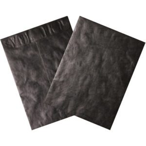 Two black 12 x 15 1/2 Black Tyvek® Envelopes from a case of 100 overlap on a white background. The matte surface reflects light, with one slightly angled over the other, and both have flap closures at the top.